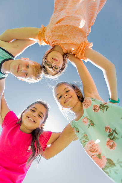 istock Group of child have fun on a field 850909270