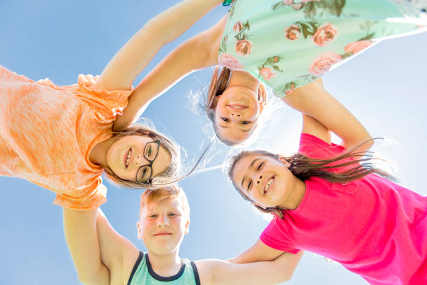 istock Group of child have fun on a field 850909644