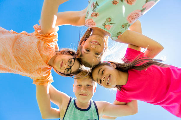 istock Group of child have fun on a field 850910262