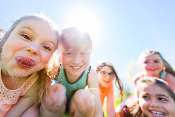 istock Group of child have fun on a field 850912412