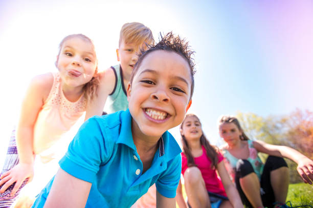 istock Group of child have fun on a field 850913172