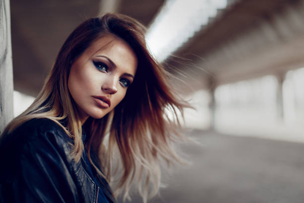 Beautiful young blonde with long hair posing