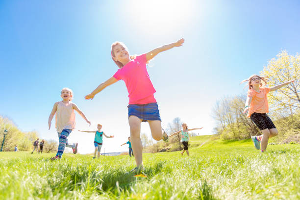 istock Group of child have fun on a field 850914044