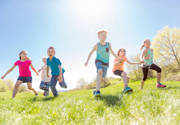 Group of child have fun on a field