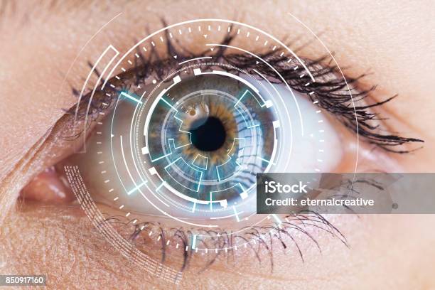 Eye Viewing Digital Information Stock Photo - Download Image Now - Eye, Eye Scanner, Retina