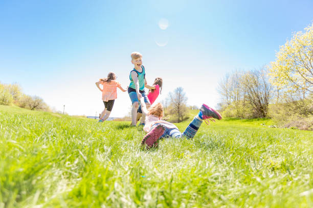 istock Group of child have fun on a field 850917352