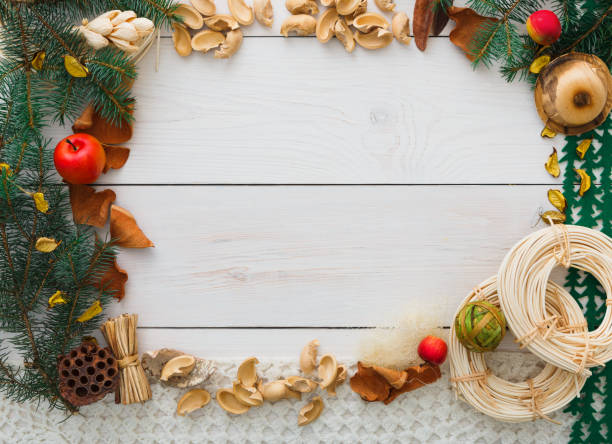 istock Christmas decoration handmade frame on white wood background copy space 850921918