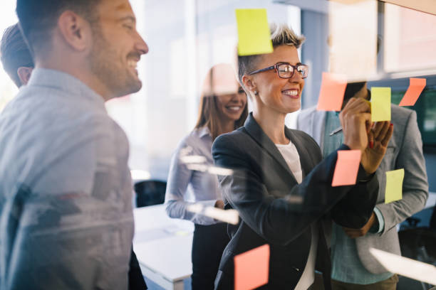istock Picture of designers sticking notes in office 850925434
