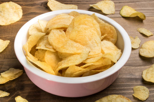 istock potato crisps in a bowl 850927280