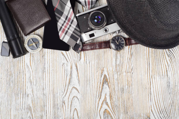 istock Hat camera mobile phone purse watch flashlight tie compass flash drive 850927964