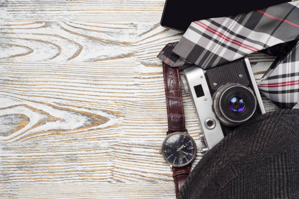 istock Hat camera mobile phone purse watch flashlight tie compass flash drive 850927972