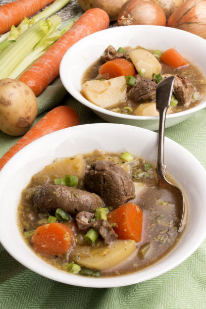 istock traditional irish lamb stew with potato, carrot, celery and spring onion 850928082