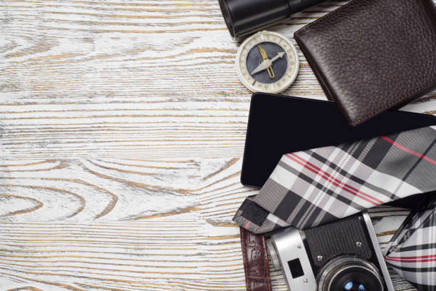 istock Hat camera mobile phone purse watch flashlight tie compass flash drive 850928144