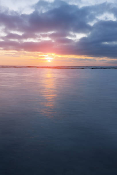 istock sunrise on the water 850932520