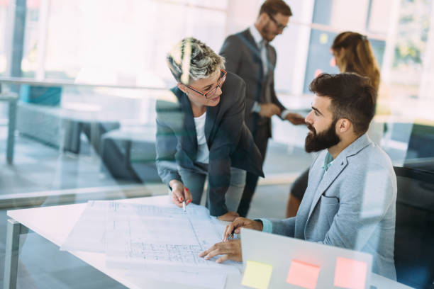 istock Portrait of young architects working in office 850935660