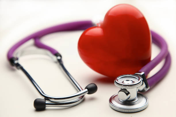 istock Heart with a medical stethoscope, isolated on white background 850940950