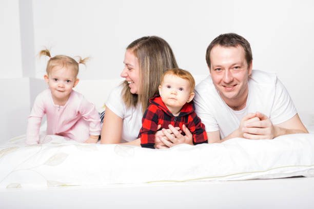 istock family from four people cheerfully spends time for beds 850941328