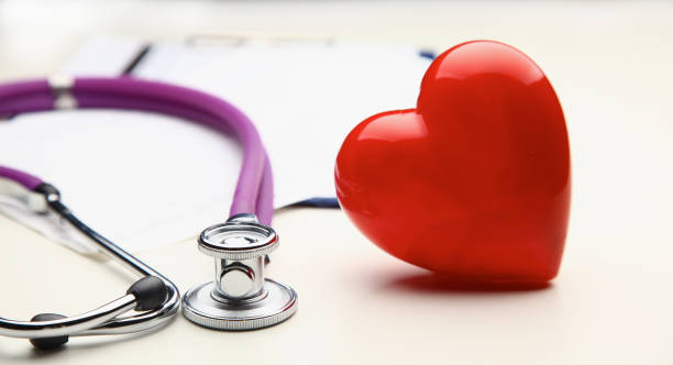 istock Heart with a medical stethoscope, isolated on white background 850941742