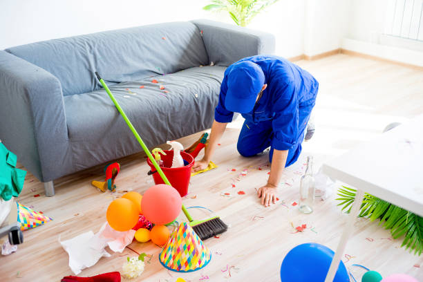 Janitor cleaning a mess A janitor is cleaning a mess after a party after party stock pictures, royalty-free photos & images