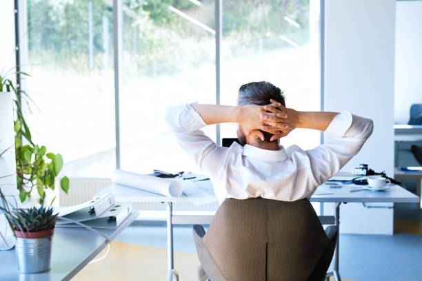 istock Businessman at the desk in his office resting. 850946414