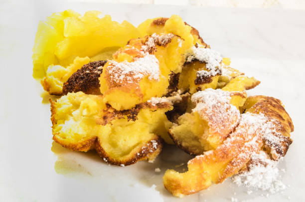 istock kaiserschmarrn, served with homemade apple compote and powdered sugar 850947512
