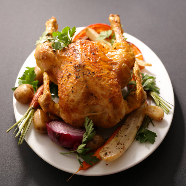 istock roast chicken and grilled vegetables 850947828
