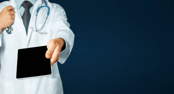 Doctor Using Tablet With Copy-Space. Healthcare And Medicine Concept stock photo