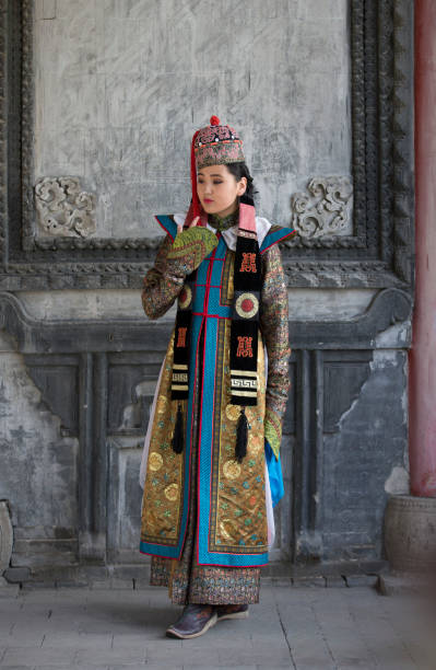 istock mongolian woman in traditional outfit 850970236
