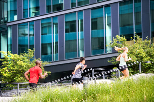 istock Young people in the city running together. 850971240
