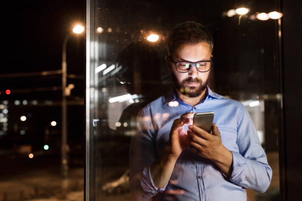 istock Businessman in the office at night working late. 850974866