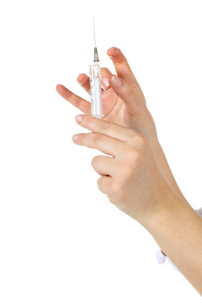 istock Syringe - medical needle isolated on white 850977662