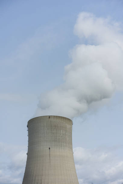 istock nuclear power plant chimney with condensation smoke on a cloudy day 850977688