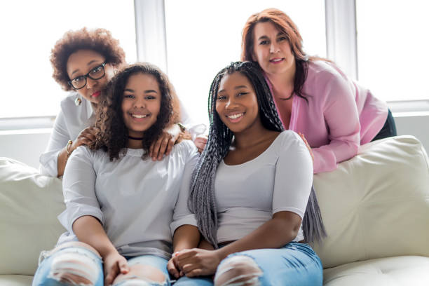istock Two family Friends Sitting On Sofa Together 850981630