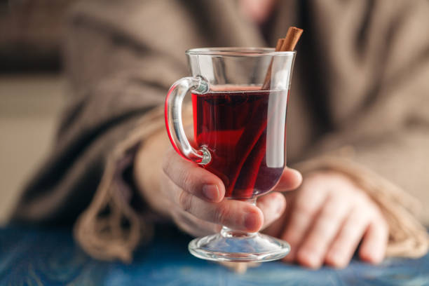 istock Homemade hot spiced wine in hand, mulled wine 850983168