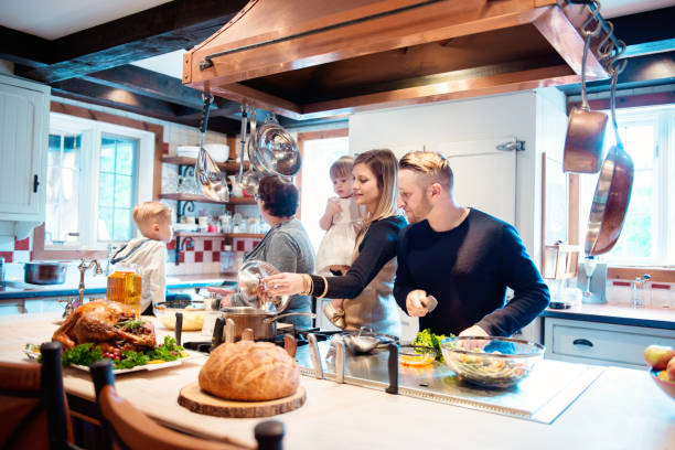istock Holiday Season family multi-generation preparing thanksgiving dinner 850986408
