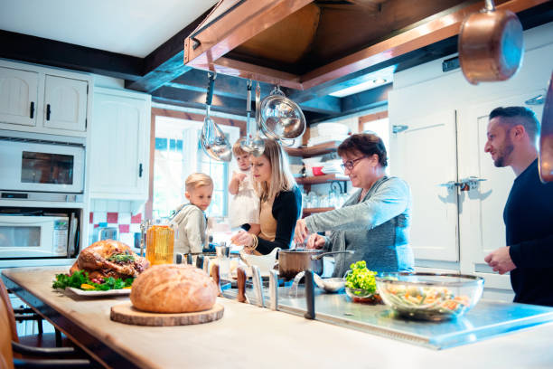 istock Holiday Season family multi-generation preparing thanksgiving dinner 850986866