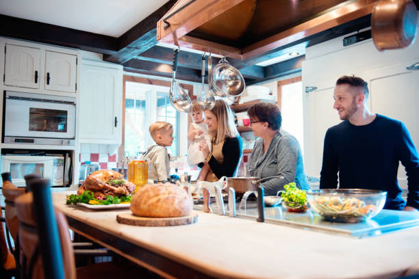 istock Holiday Season family multi-generation preparing thanksgiving dinner 850986968
