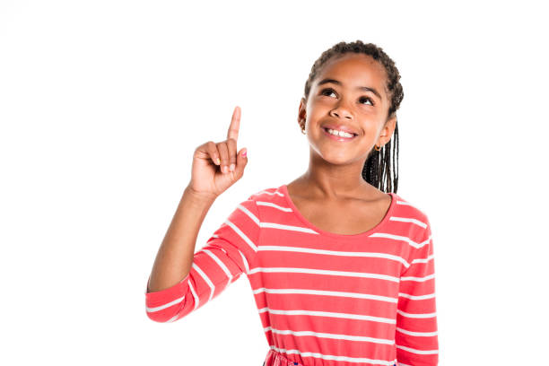 Adorable african little girl on studio white background