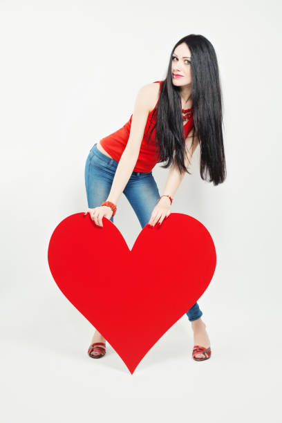 istock Cute Woman holding Big Red Heart 850993034