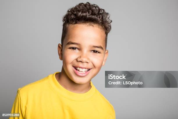Adorable African Boy On Studio Gray Background Stock Photo - Download Image Now - Boys, Child, 8-9 Years
