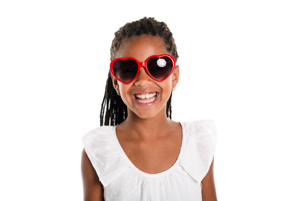 An Adorable african little girl on studio white background