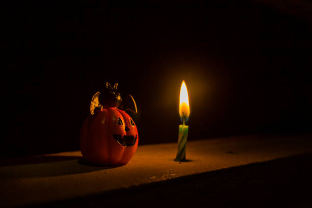 istock Halloween pumpkin smile and bat on head 850996208