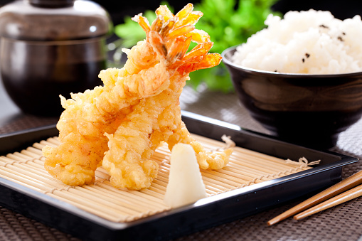 Tempura shrimps and kimchi with rice.