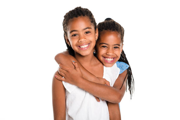 istock Two Adorable african twin girl on studio white background 850997016