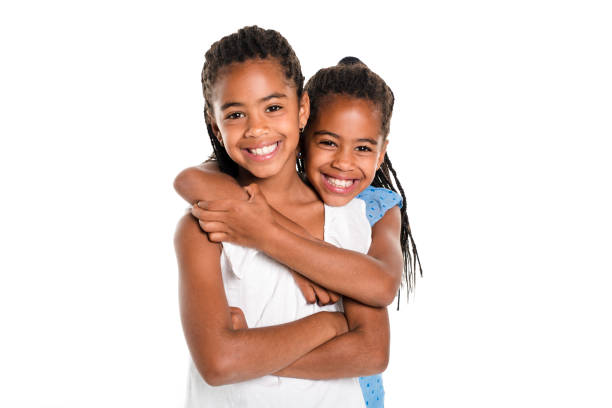 istock Two Adorable african twin girl on studio white background 850997088