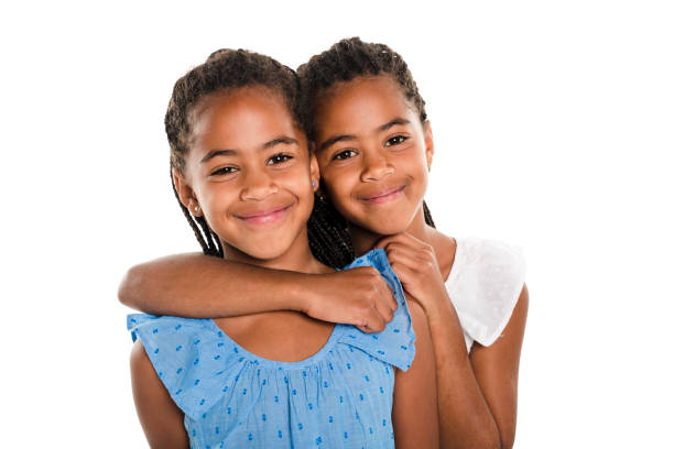 istock Two Adorable african twin girl on studio white background 850997464
