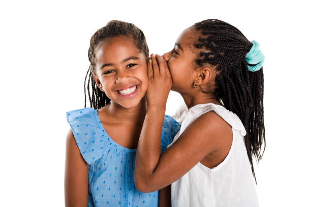 istock Two Adorable african twin girl on studio white background 850999738