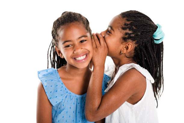 istock Two Adorable african twin girl on studio white background 850999824