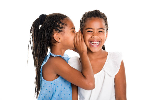 istock Two Adorable african twin girl on studio white background 850999898
