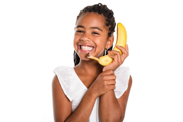 Adorable african little girl on studio white background
